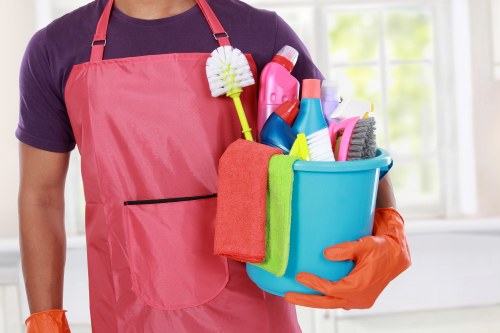 Workers and cleaning equipment representing ethical labour standards at Carpetcleaning Kentishtown