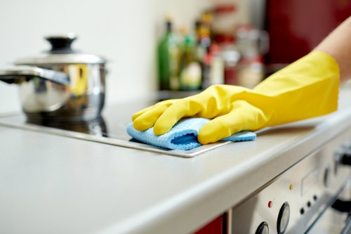 Technician preparing a safe carpet cleaning work area