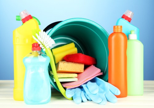 Cleaner using protective gloves and equipment during carpet care