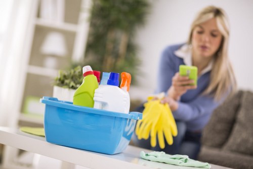 Cleaning technician reviewing service details before work begins